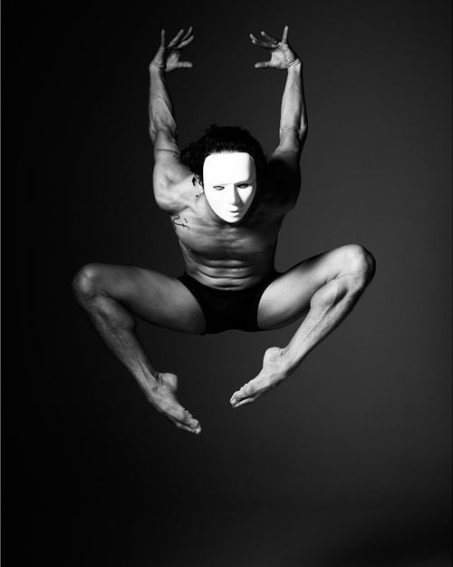 Novy Bereber in mid-air, black and white studio portrait