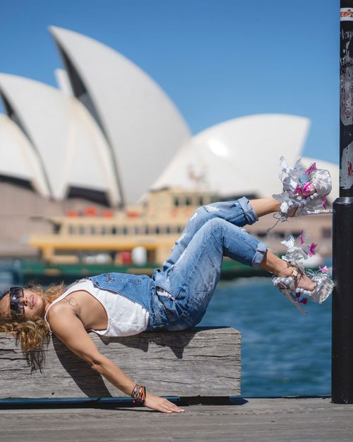 Novy Bereber mid-leap in front of the Sydney Opera House
